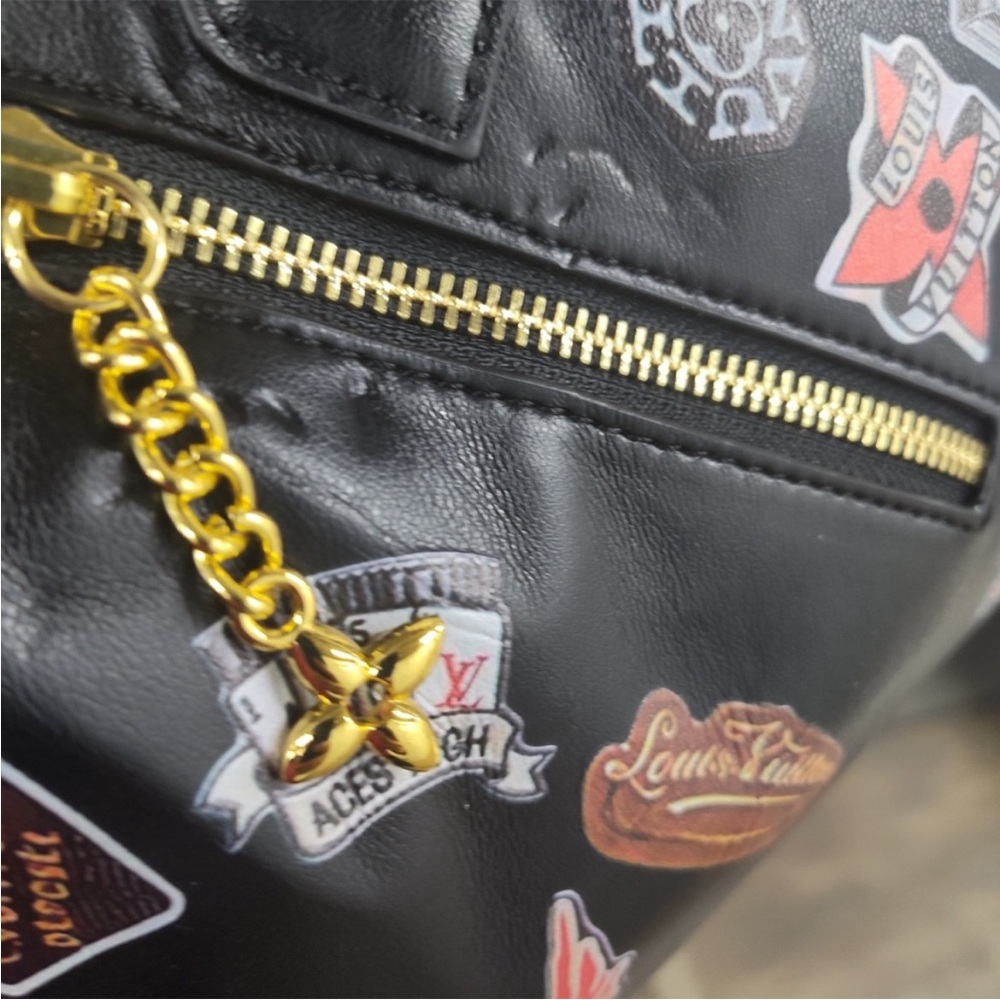 Stylish Black Satchel with Patchwork Design - image 2